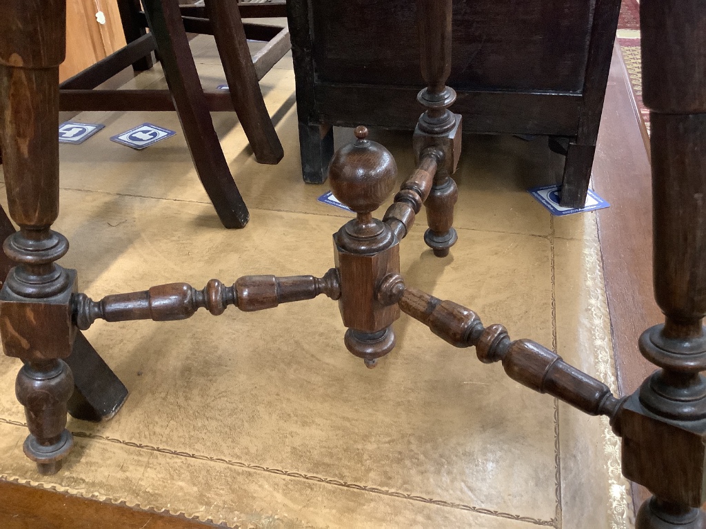 An Edwardian octagonal oak occasional table, width 60cm depth 62cm